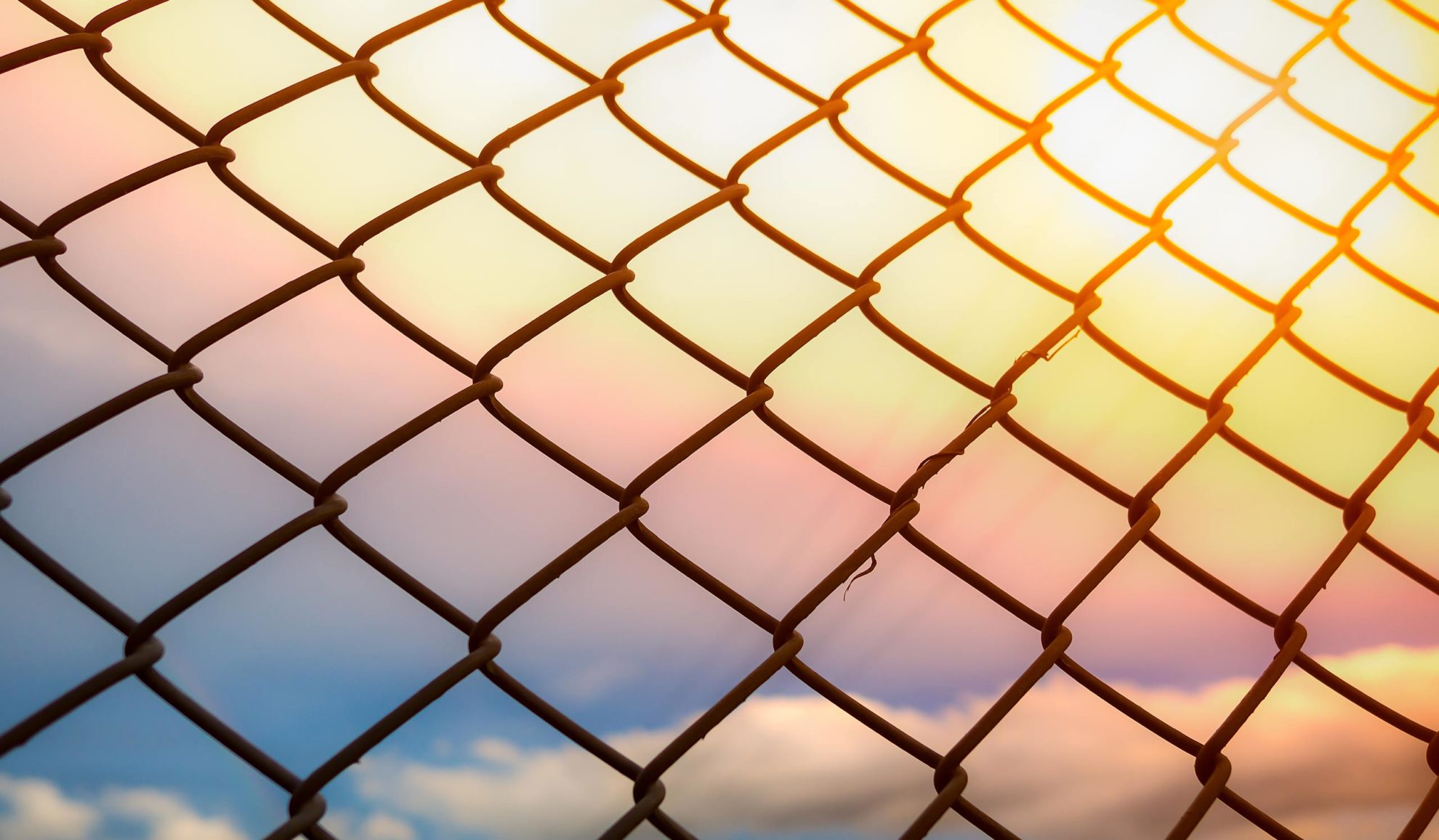 chainlink-fence-and-sunset-bakersfield-ca